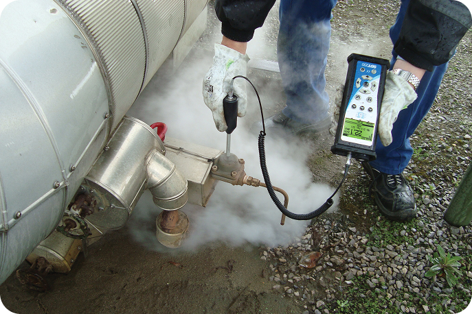 Steam Trap Failures Waste Energy and Cause Corrosion Technician using SDT200 ultrasonic device to test steam trap performance and detect steam leakage.