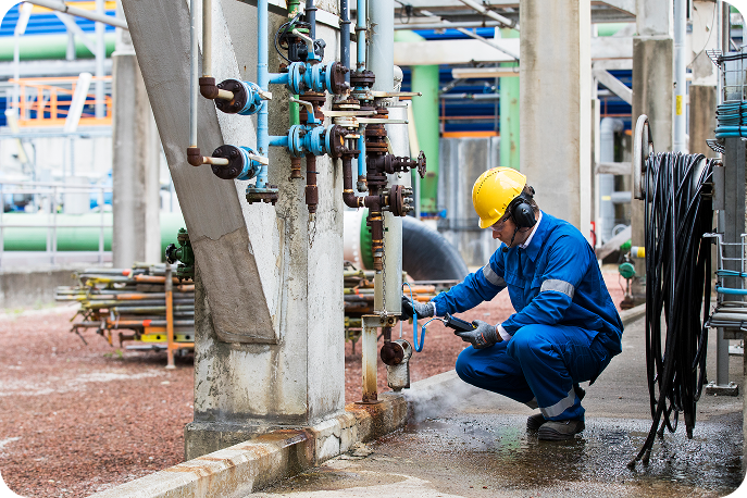 Reduce Energy Waste and Downtime Risks with Ultrasound Inspections Technician using SDT340 ultrasound detector to test valve condition and identify internal leakage.